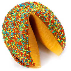 This classic colored giant fortune cookie comes covered in milk chocolate and bright confetti, perfect for almost any occasion.