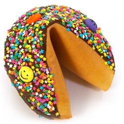 Dark Chocolate covered giant fortune cookie with colorful stars and smiley faces