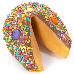 Milk Chocolate covered giant fortune cookie with colorful stars and smiley faces