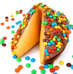 Giant fortune cookies covered in sweet milk chocolate and then decorated with real chocolate m&m's