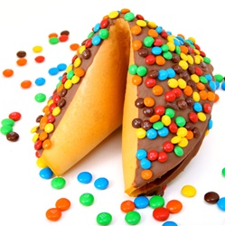 Giant fortune cookies covered in sweet milk chocolate and then decorated with real chocolate m&m's