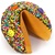 Dark Chocolate covered giant fortune cookie decorated with colorful stars and fun smiley faces