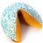 White chocolate covered giant fortune cookies decorated with blue and white sprinkles, perfect for a baby boy.