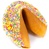 White Chocolate covered giant fortune cookie with birthday candies and pastel sprinkles